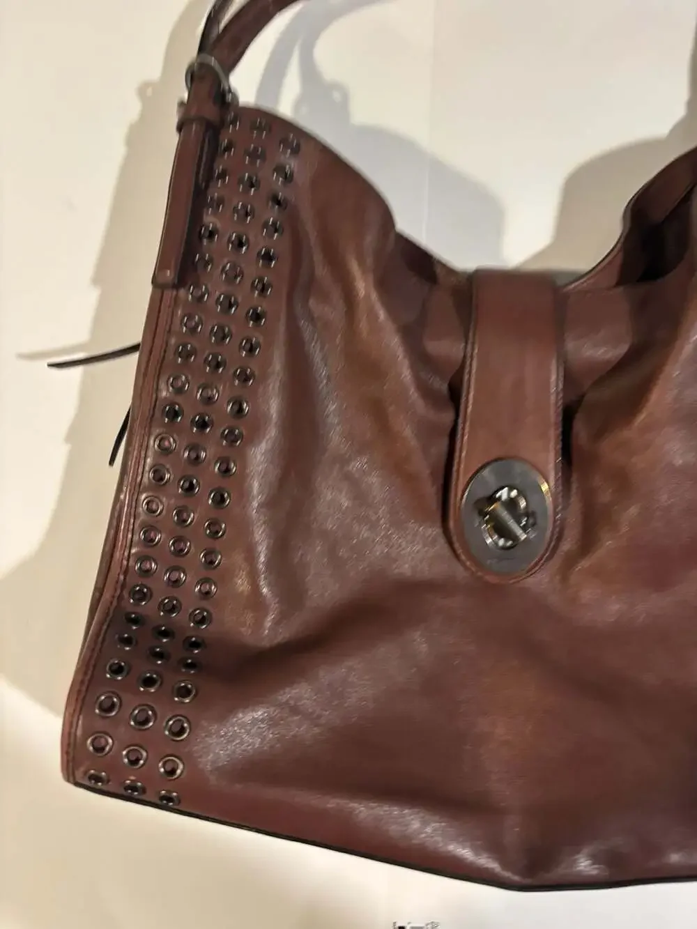 Coach Brown Leather Hobo Shoulder Bag with Grommets and Turnlock Closure